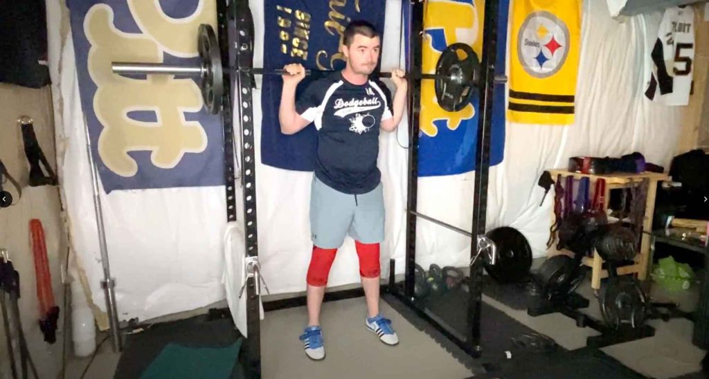 Barbell squatting as a compound exercise for the best exercise plan for extremely busy people.
