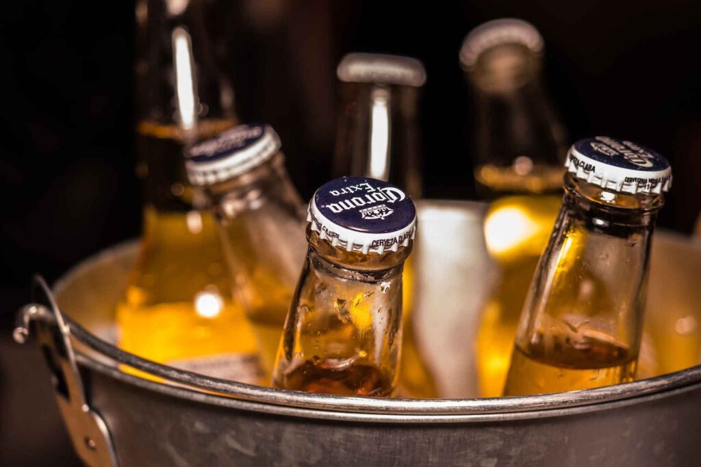 Six coronas in a bucket with ice