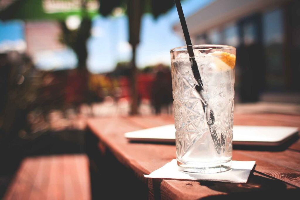 A mixed drink sitting on a table